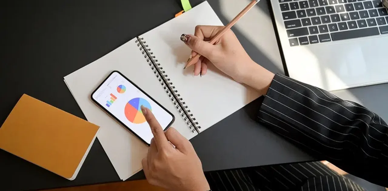 person-writing-on-white-paper-3815585